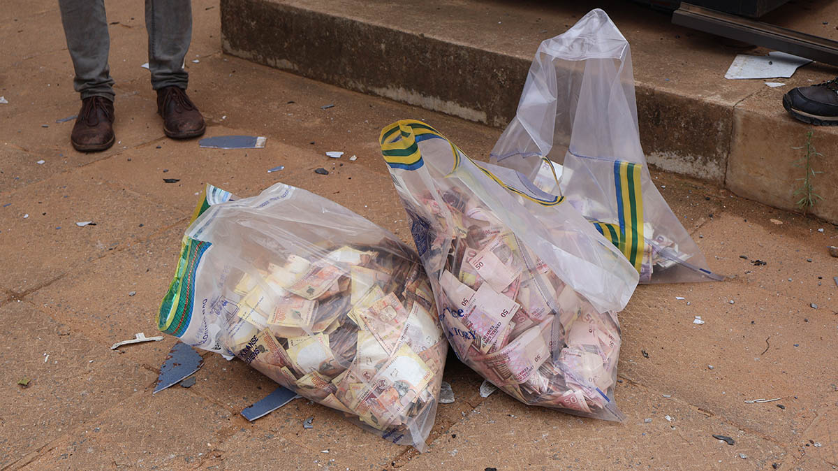 Some of the cash recovered from the bombed ATM. The bombers failed to access it.